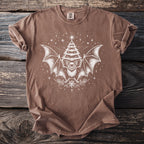 Brown t-shirt with a white graphic of a bat and a Christmas tree.