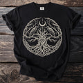 Black t-shirt featuring a circular design of a tree, ravens, eye, moon and runes.