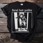 Black t-shirt with "feral but polite" and werewolf graphic.