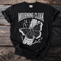 Black t-shirt with white "Mourning Cloak" text and butterfly graphic.