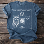Dark blue t-shirt with "local cryptid support group" text and illustrated raccoon, opossum, cat, bat, and frog.