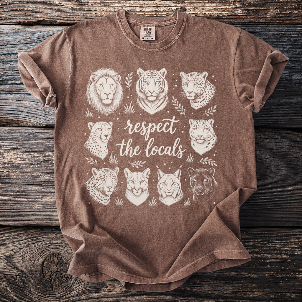 Brown t-shirt with line art of lion, tiger, leopards, cougar, lynx, and panther with "respect the locals" text.
