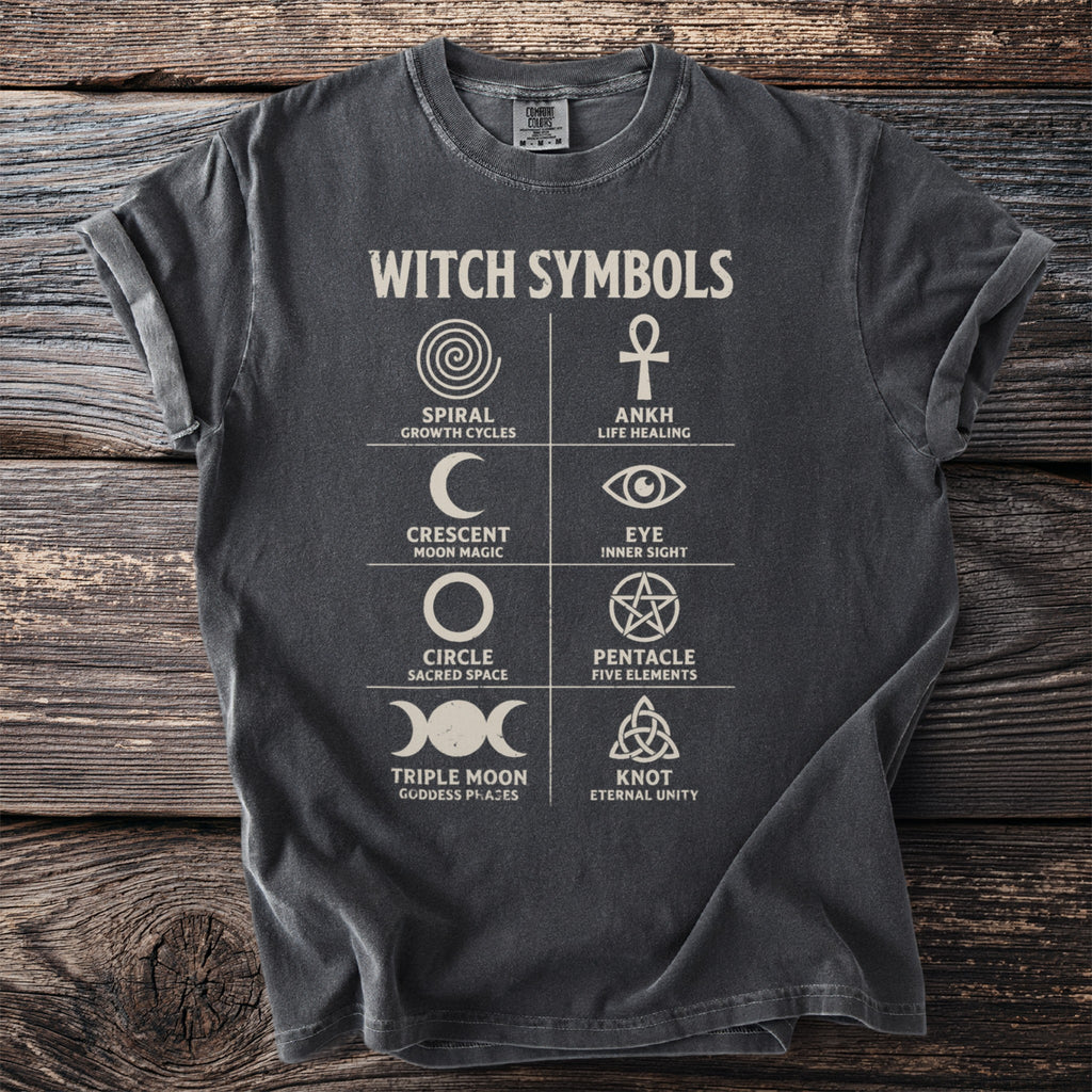 T-shirt with "Witch Symbols" graphic featuring Spiral, Ankh, Crescent, Eye, Circle, Pentacle, Triple Moon, and Knot.