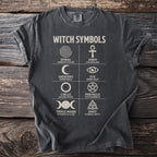 T-shirt with "Witch Symbols" graphic featuring Spiral, Ankh, Crescent, Eye, Circle, Pentacle, Triple Moon, and Knot.