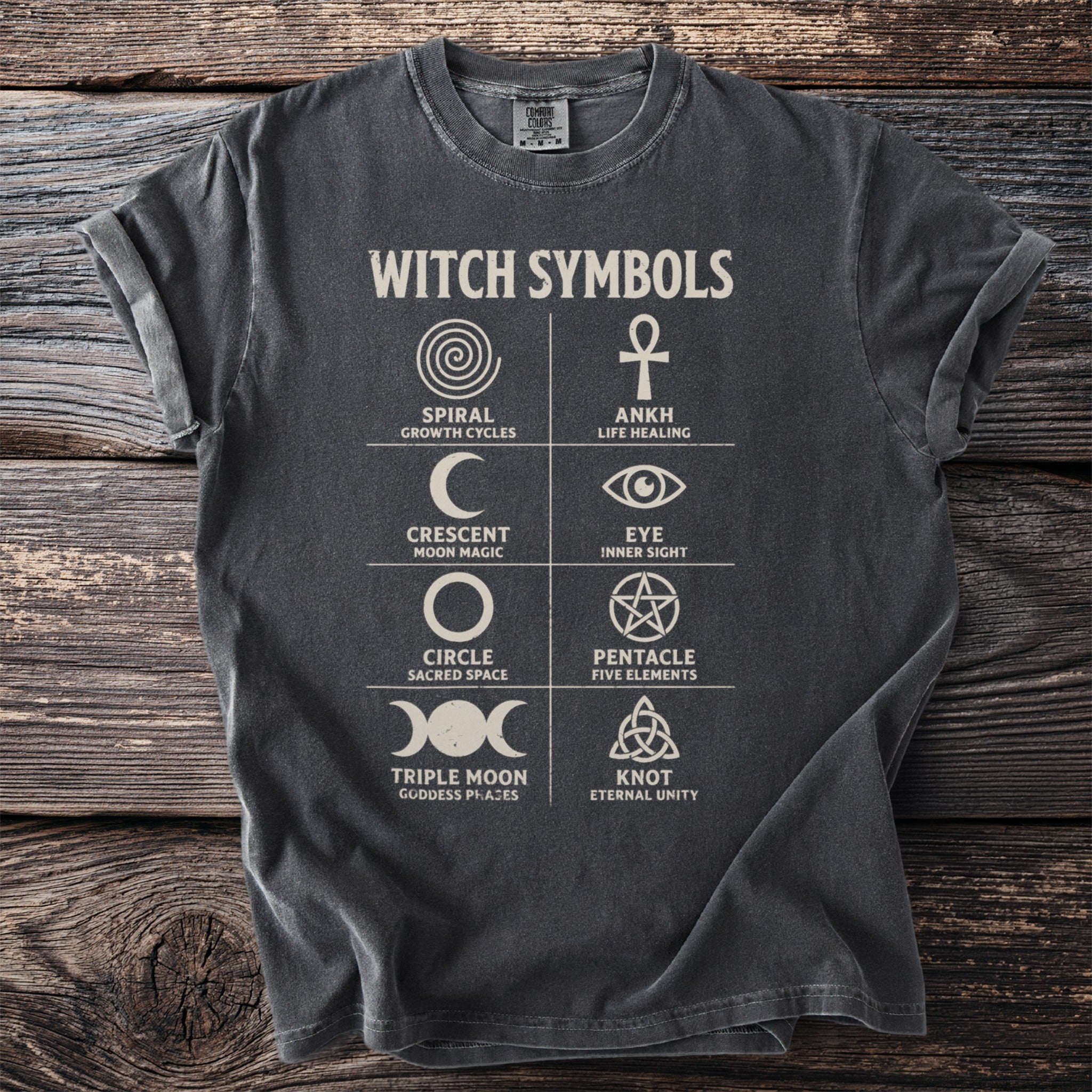 T-shirt with "Witch Symbols" graphic featuring Spiral, Ankh, Crescent, Eye, Circle, Pentacle, Triple Moon, and Knot.