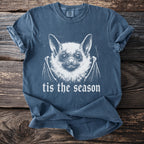 Blue short-sleeve t-shirt with a white bat graphic and "tis the season" text.
