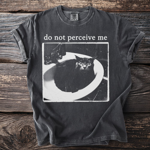 Dark t-shirt with a black cat in a sink and text "do not perceive me".