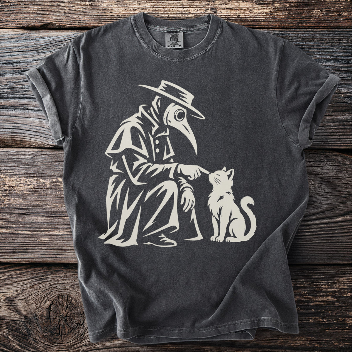 Plague doctor in mask and hat touching a white cat on a dark grey t-shirt.
