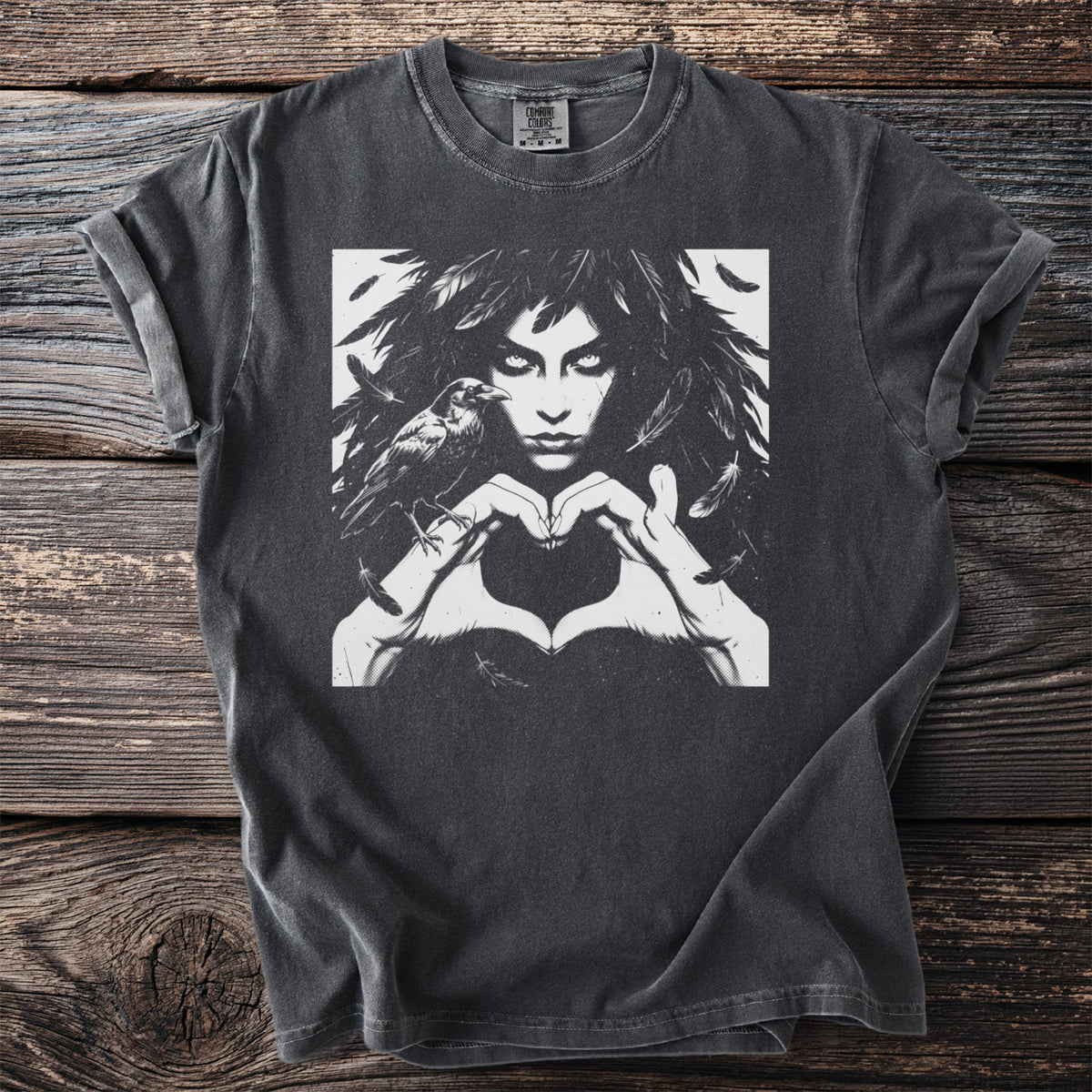 Charcoal t-shirt with black and white gothic graphic of woman with raven and heart hands.