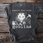 Dark grey t-shirt with opossum and text reading "support your local goblins".