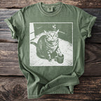 Green t-shirt with a distressed graphic of a cat holding a cigarette and a coffee mug.