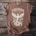 Brown t-shirt with white "Firebird russian zhar ptitsa folklore" text and phoenix graphic.