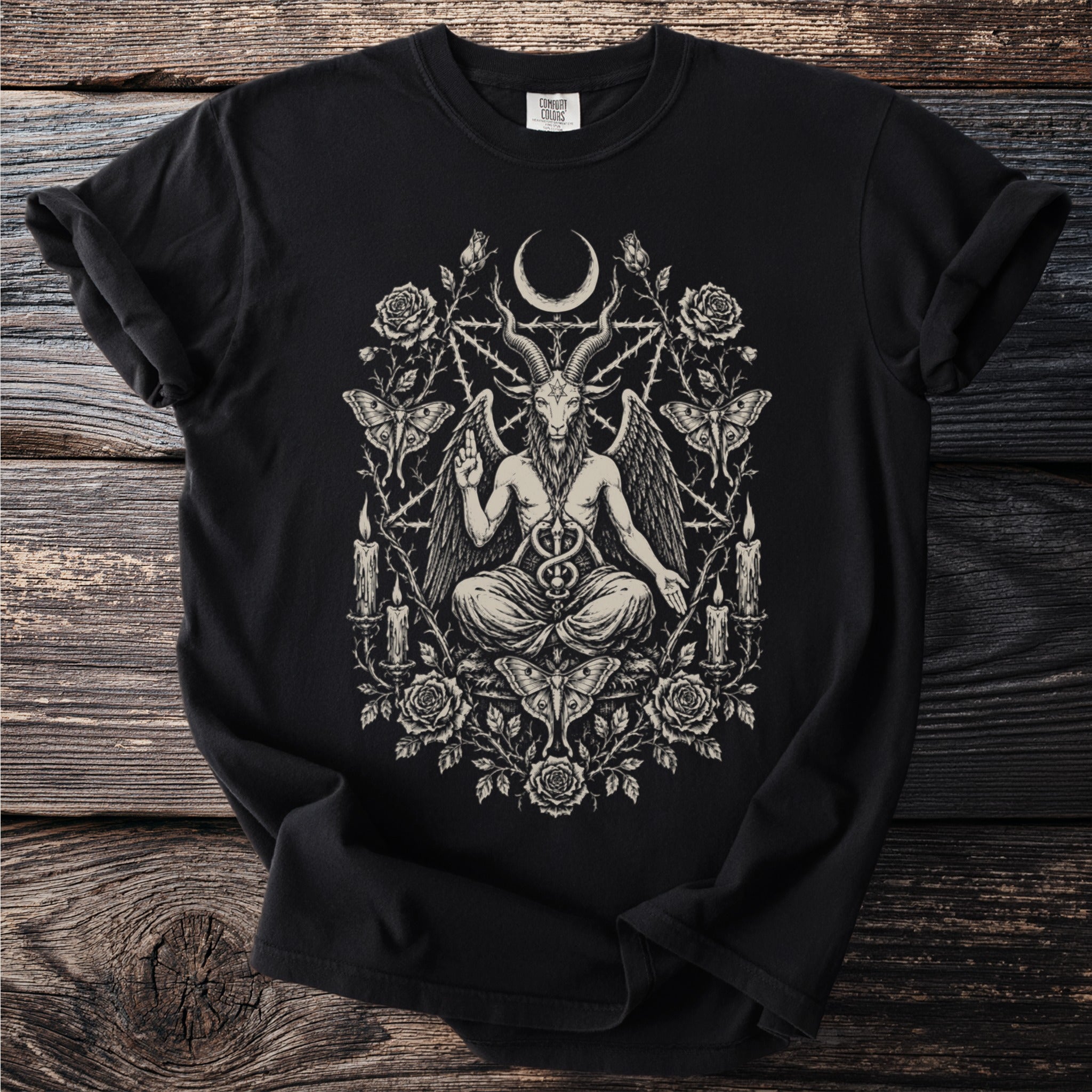 Black t-shirt with Baphomet, crescent moon, roses, moths, and candles graphic.