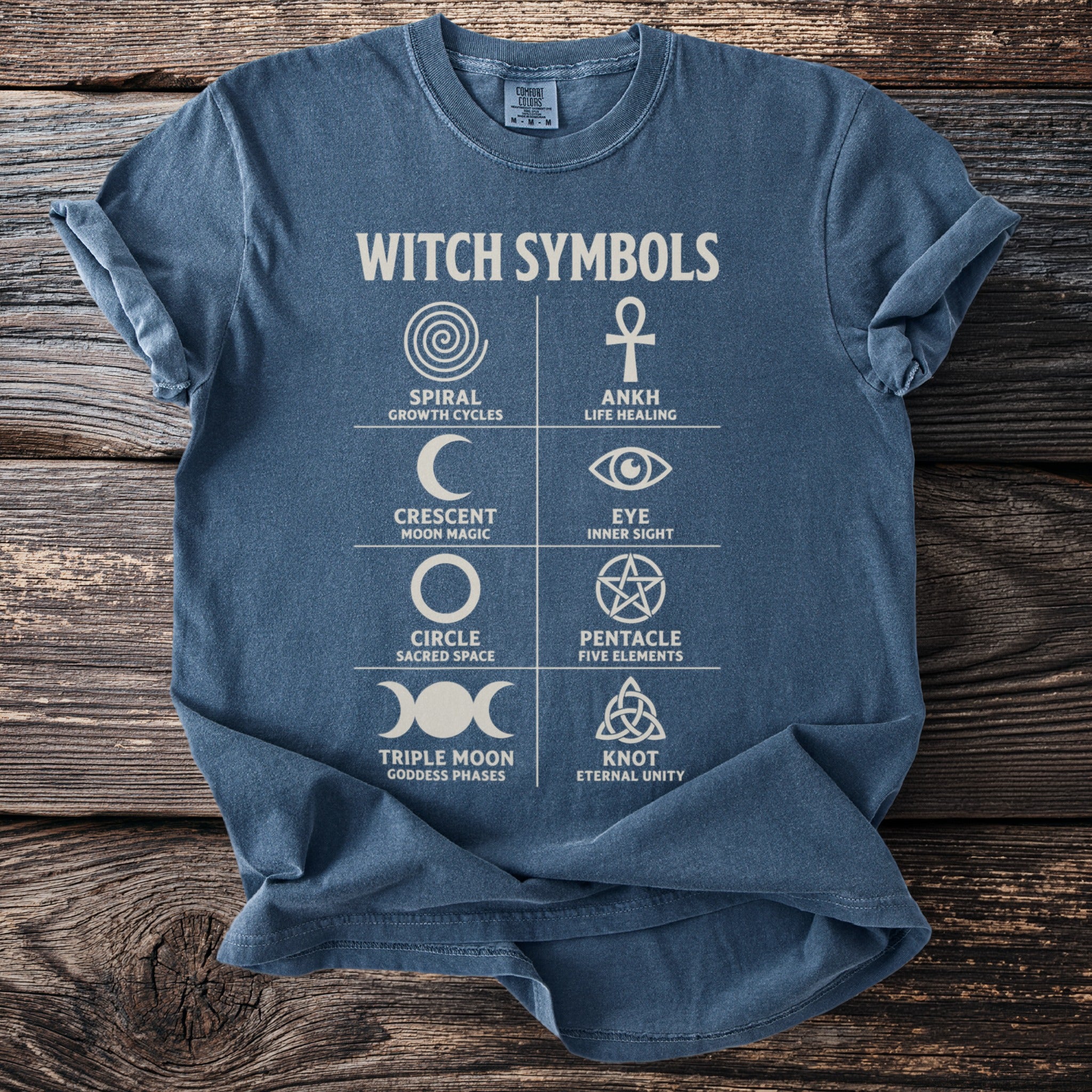 Blue t-shirt with "WITCH SYMBOLS" and eight symbols with descriptions.