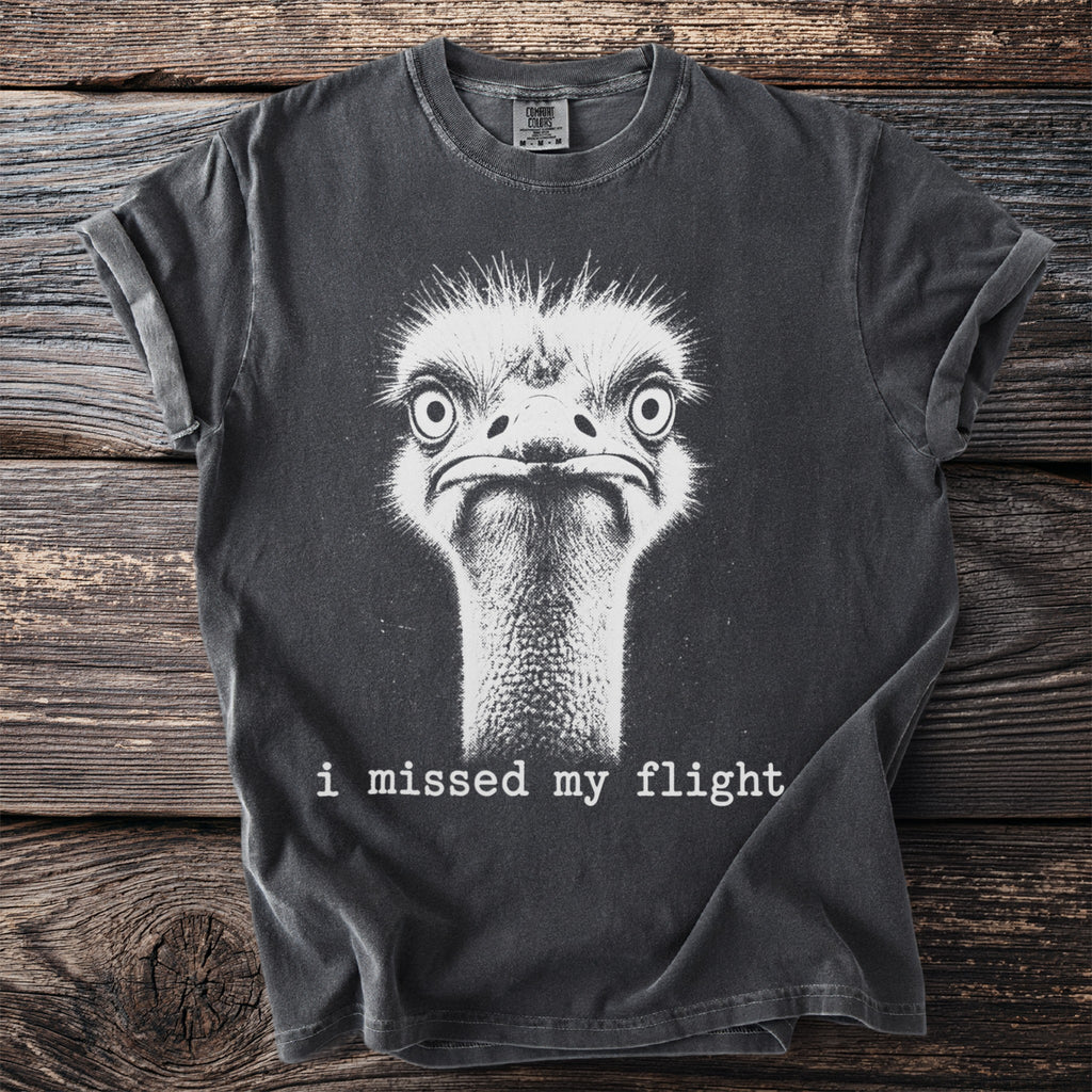 Graphic gray t-shirt with a close-up image of an ostrich and the text "i missed my flight".