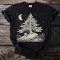 Black t-shirt with moon, stars, tree, pumpkin, and cobweb graphic.