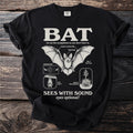 Black t-shirt with "BAT" and illustrations explaining bat senses, navigation, and pollination.