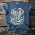 Blue t-shirt with a mystical wizard, wolves, eagles, and rune stones graphic.