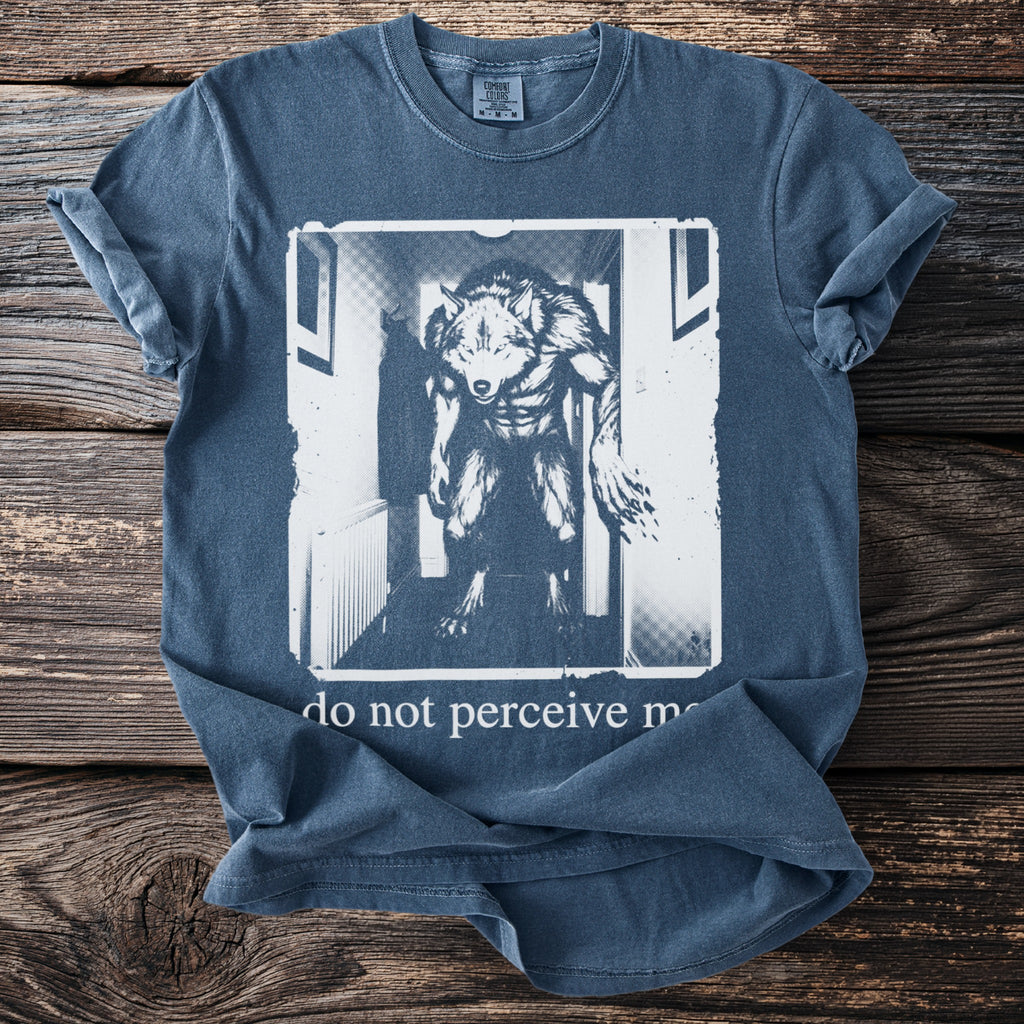 Blue t-shirt with werewolf illustration and "do not perceive me" text.