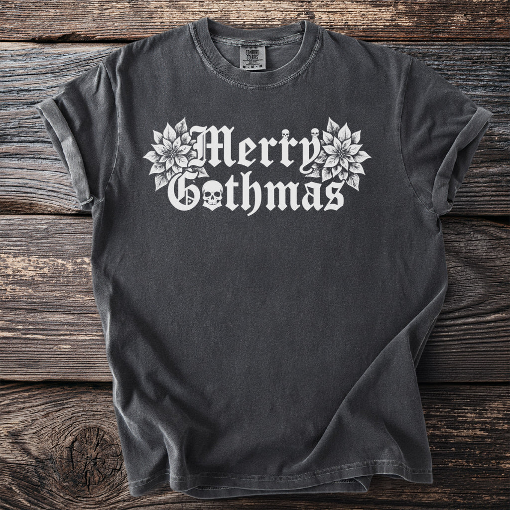 Dark grey t-shirt with white "Merry Gothmas" text and skull graphic.