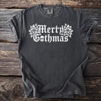 Dark grey t-shirt with white "Merry Gothmas" text and skull graphic.