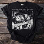 Black t-shirt with "support your local goblins" and opossums on a wooden fence.