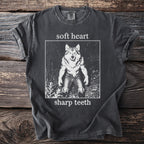 Dark grey t-shirt with wolf graphic and text "soft heart sharp teeth".