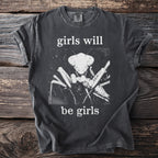Dark grey t-shirt with a praying mantis graphic and text "girls will be girls".