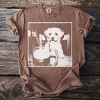 Brown t-shirt with image of a dog looking at a beer being poured into a mug.
