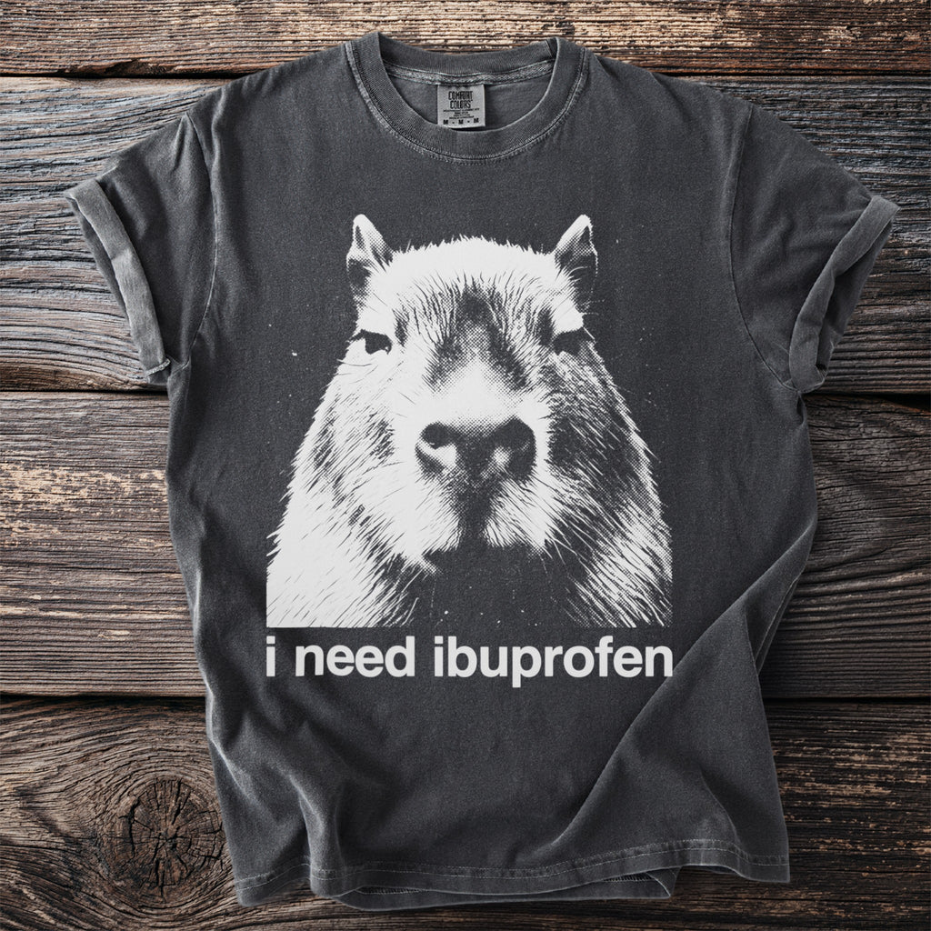 Charcoal t-shirt with capybara graphic and "i need ibuprofen" text.
