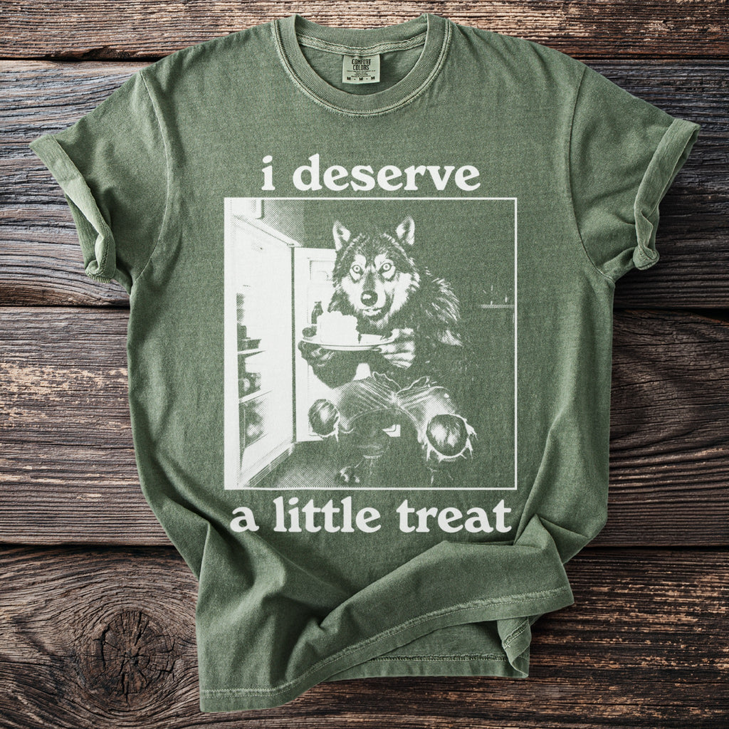 Green t-shirt with wolf at open refrigerator holding cake, text "i deserve a little treat".