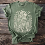 Green t-shirt with a cream print of a winged figure driving a chariot pulled by cats.