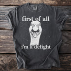 Dark gray t-shirt with a goose face and text "first of all i'm a delight".