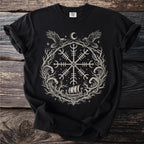 Black t-shirt with a white graphic of a Vegvísir, ravens, crescent moon, and Viking longship.
