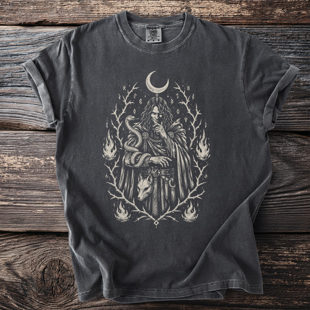 Dark grey t-shirt with a mystical illustration of a figure, snake, fox mask, and flames.