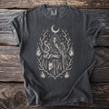 Dark gray t-shirt showing Loki in a serpent cloak with a fox, moon, and flames.
