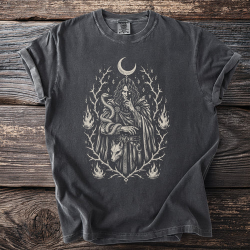 Dark grey t-shirt with a mystical illustration of a figure, snake, fox mask, and flames.