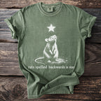 Green t-shirt with white graphic of a rat looking up at a star, text reads "rats spelled backwards is star".