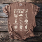 Brown t-shirt with "Protect Your Energy" and nine illustrated symbols with captions.
