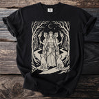 Black t-shirt with a graphic featuring a crowned triple goddess, keys, two dogs, and torches.