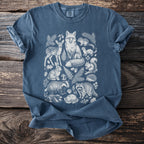 Blue t-shirt with white woodland animal illustration including fox, deer, badger, and squirrel.