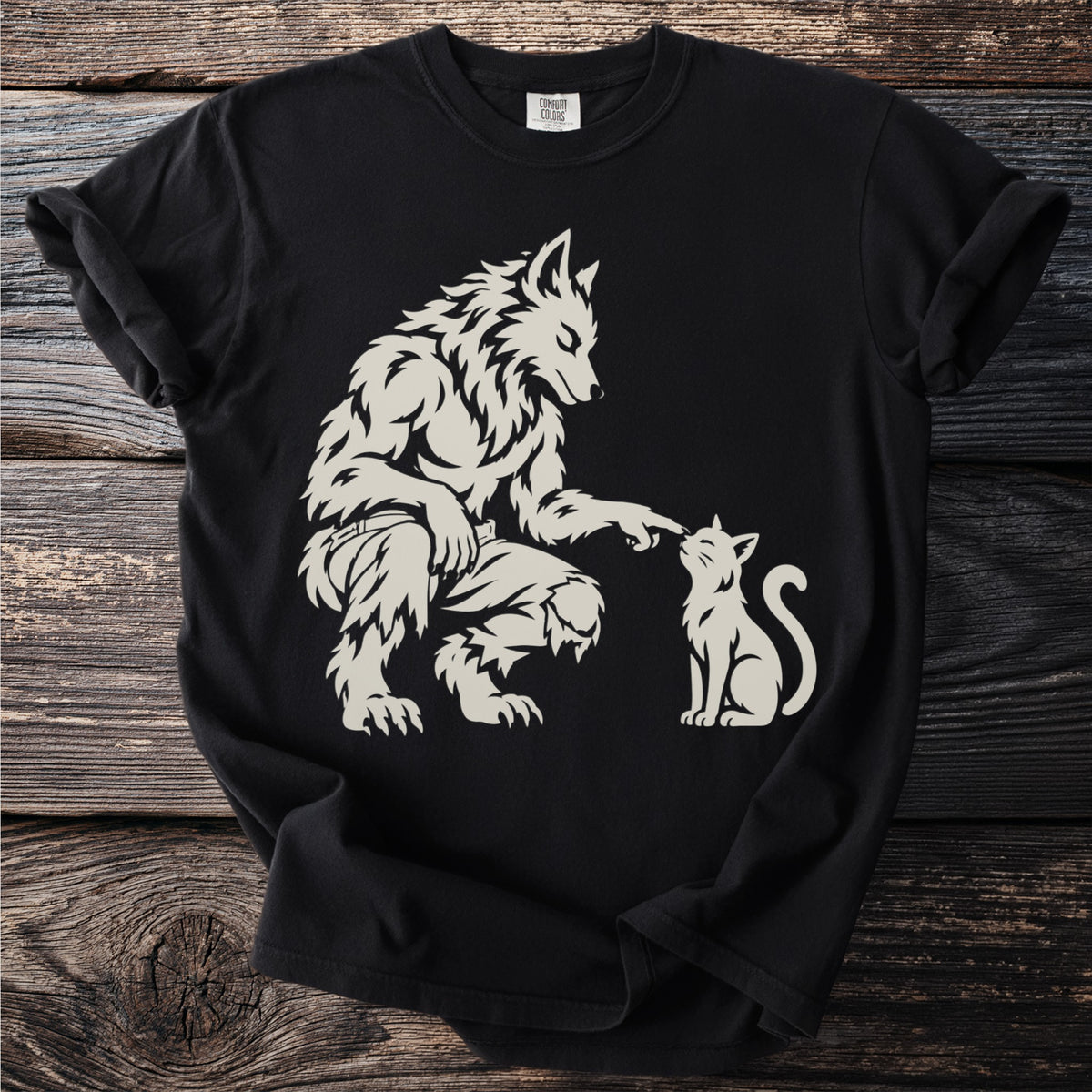 Werewolf gently touching nose of a white cat, printed on a black t-shirt.