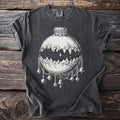 Dark grey t-shirt with white graphic of a moon phase ornament with mountains and bells.