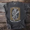 Dark gray t-shirt with a Krampus illustration and "Naughty List Approved" text.