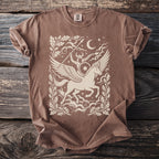 Brown t-shirt with winged horse and warrior graphic, moon, and oak leaves.