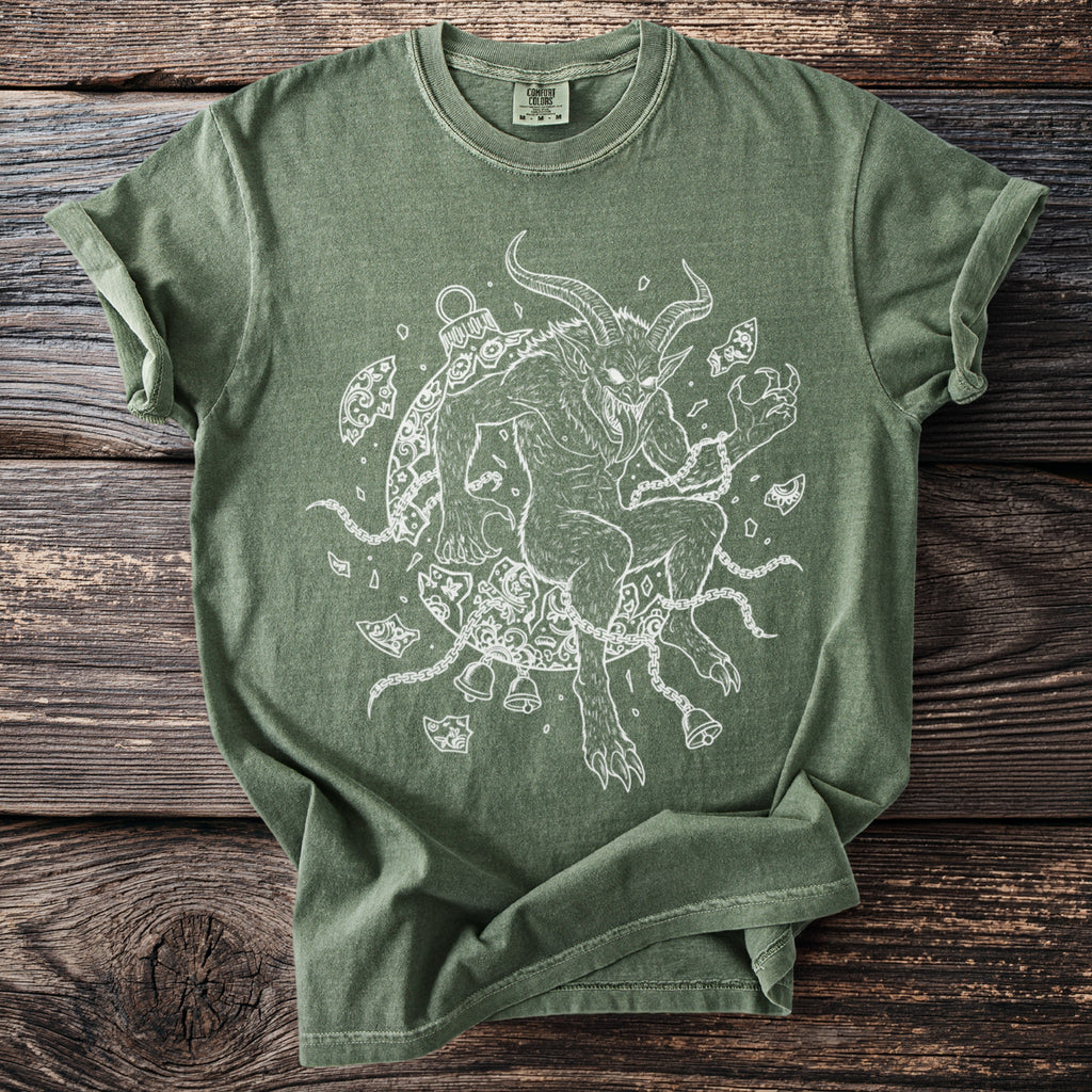 Green t-shirt with white line art of Krampus wrapped in chains and bells.