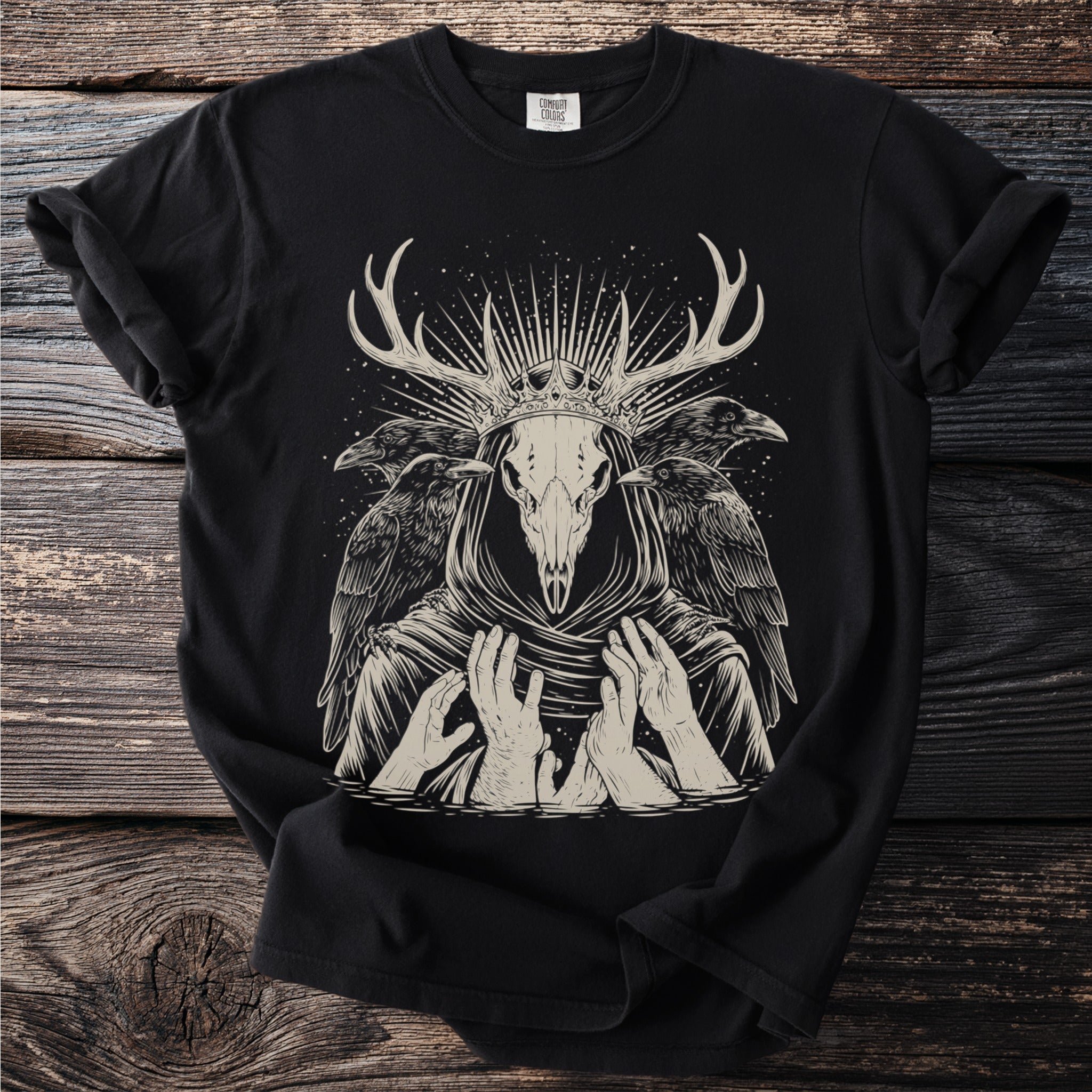Black t-shirt with skeletal deer skull, ravens, and hands design.