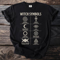 Black t-shirt with "Witch Symbols" and eight symbols with descriptions.