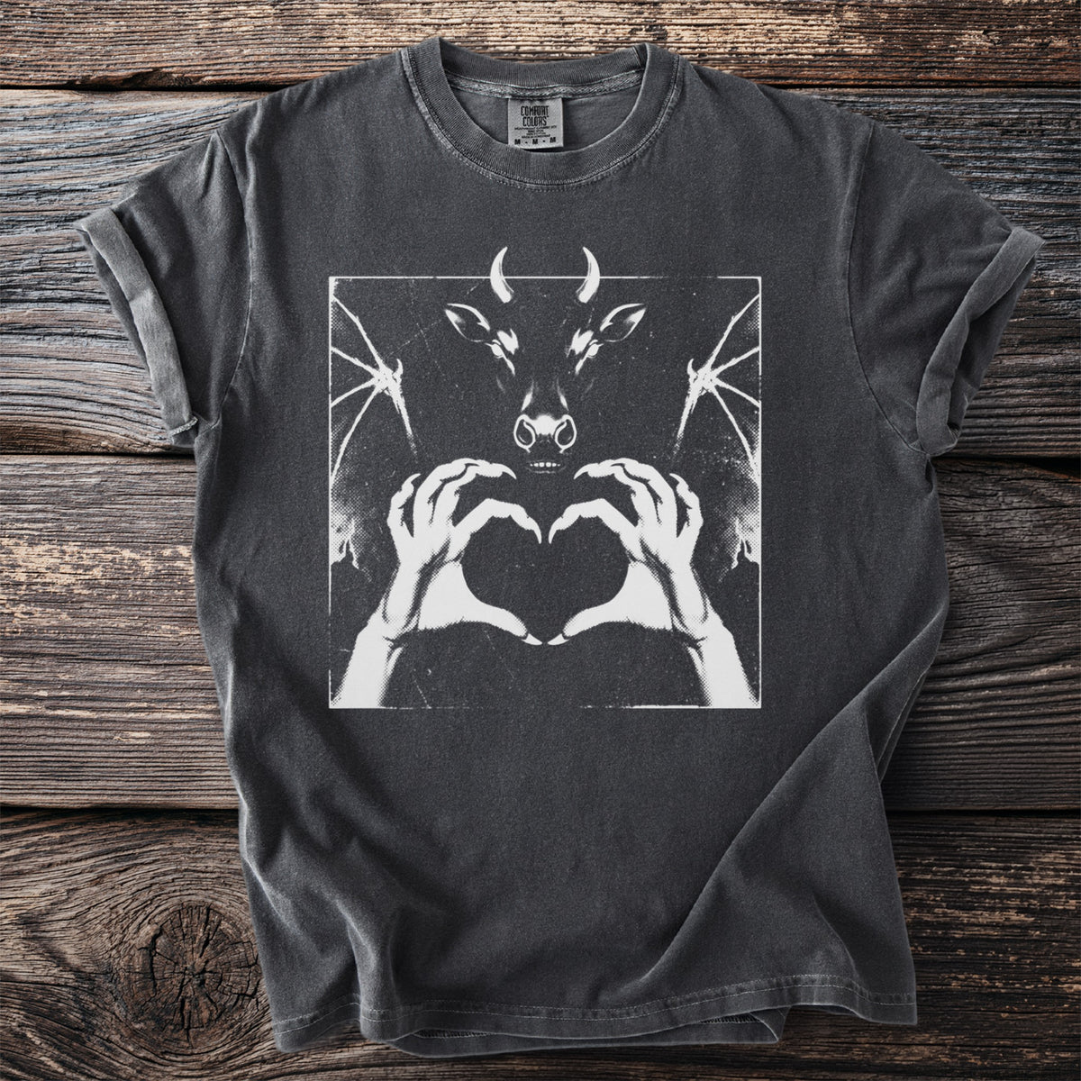 Dark gray t-shirt with a white graphic of a horned devil face and hands forming a heart.