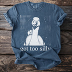 Blue t-shirt with a white graphic of a goose and text "got too silly".